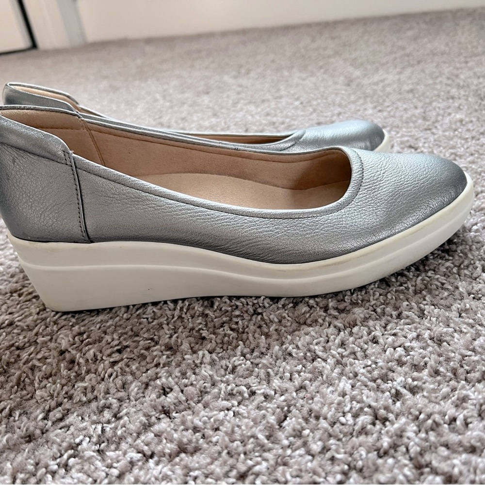 Super comfy silver wedges.